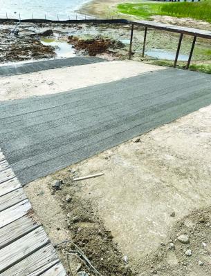 Courtesy Photos/ Wendy Spivey A series of photos shows the progress Precinct 1 workers made on fixing the Caney City boat ramp on Cedar Creek Lake, one of the few remaining places that the public can launch a boat free of charge, according to Precinct 1 Commissioner Wendy Spivey.