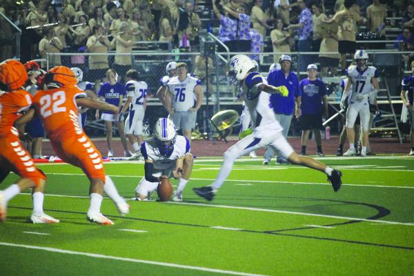 Monitor Photo/Russell Slaton Ryne Dowell of Eustace kicks the extra point following the final touchdown of the night for his team, which gave new Eustace head coach Phillip Smith his first win.