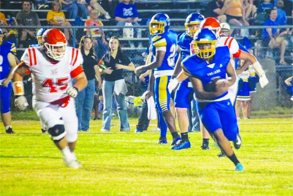 Monitor Photo/Russell Slaton Trinidad running back Zakadrine Thirkhill eyes the endzone pylon while gathering steam for a Sept. 24 touchdown jaunt at Trojan Field.