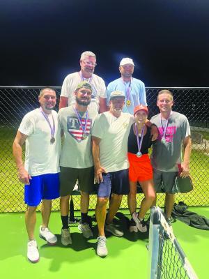 Courtesy Photo/Karla Dunson BOTTOM RIGHT: Winners from Tool’s first-ever Pickleball and Pints League in summer 2026 (with host Mike VanderBosch, center front) include the first-place team Triple H (Richard Hall and Hunter Foster, rear), the second place Duggernauts (Jake and Michelle Duggernauts, right front) and the third place Paddle Warriors (Aaron Rogers and Brian Miranda, left front). Not pictured is Shannon Hall of Triple H.