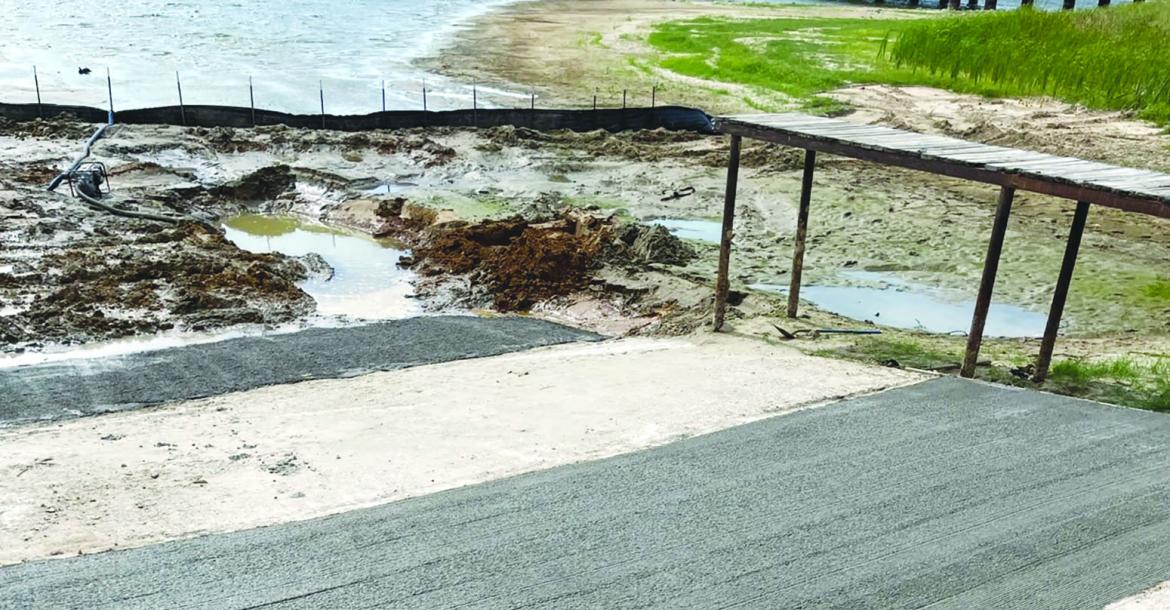 Courtesy Photos/ Wendy Spivey A series of photos shows the progress Precinct 1 workers made on fixing the Caney City boat ramp on Cedar Creek Lake, one of the few remaining places that the public can launch a boat free of charge, according to Precinct 1 Commissioner Wendy Spivey.